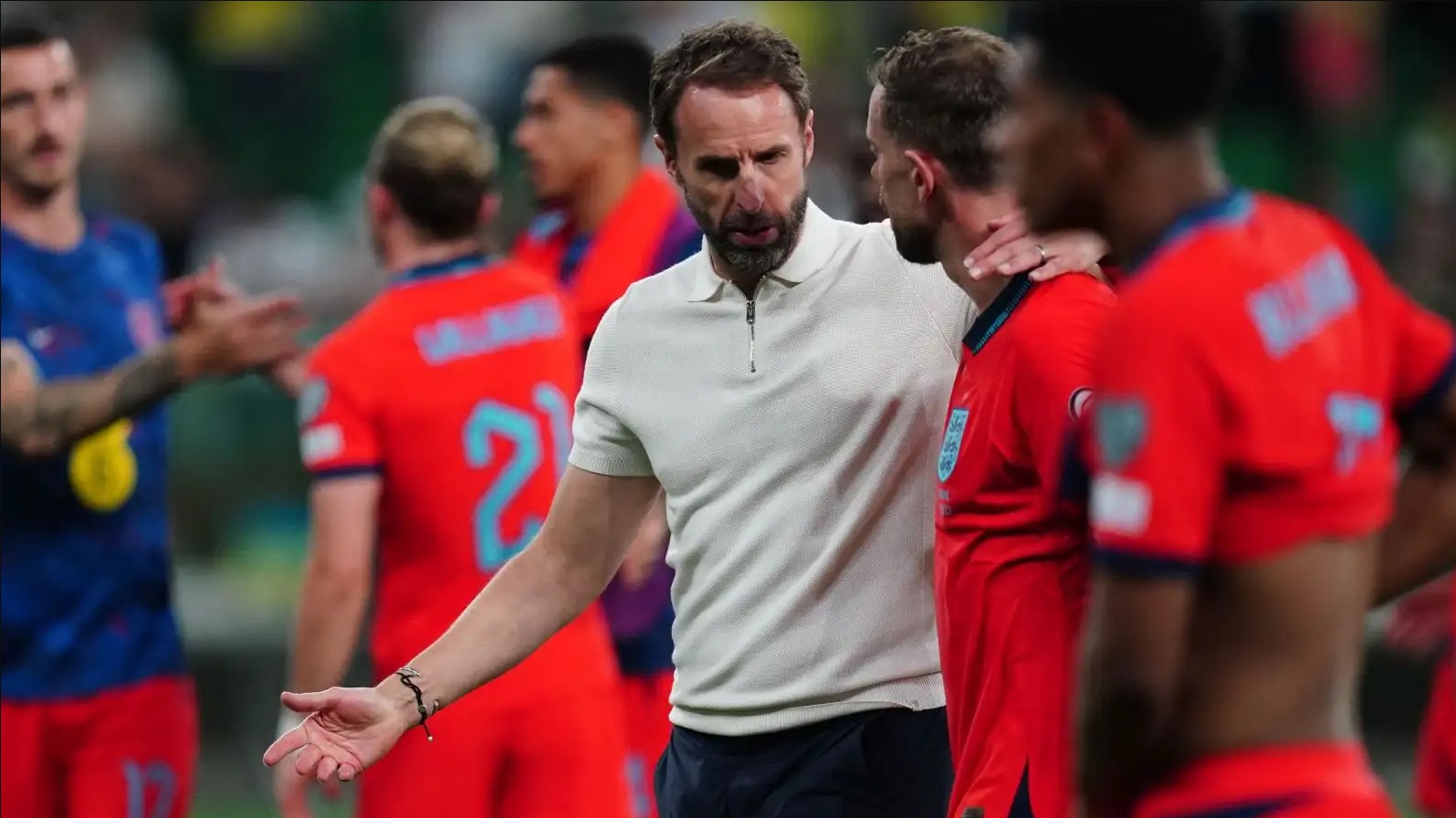 The England Manager providing feedback.